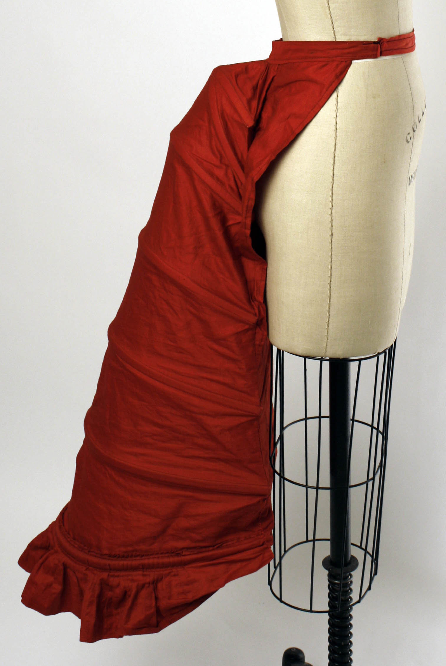 1870s Lobster tail bustle, side view